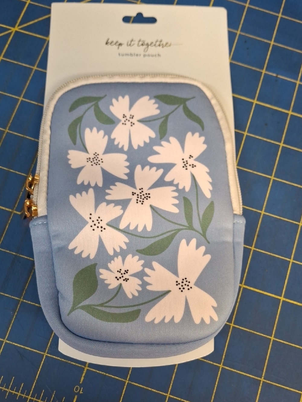 Garven Floral Hydration Zipper Pouch is a light blue neoprene carrier